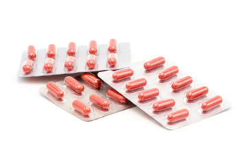 Supplements and pills blister packs, close-up. Place to insert your text, white background. Concept...