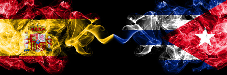 Spain vs Cuba, Cuban smoky mystic flags placed side by side. Thick colored silky smokes flag of Spanish and Cuba, Cuban