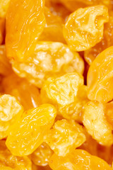 Yellow raisins as background