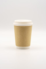 Blank paper cup of coffee with a plastic cap. Paper Cup Layout For Advertising. Empty Place for Logo Placement