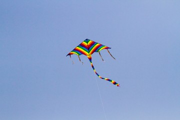 Children's favorite toy kite on windy days in spring