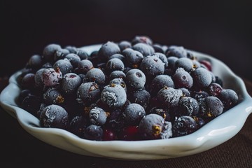 black currant, berries, frozen currant, still life, dark background
