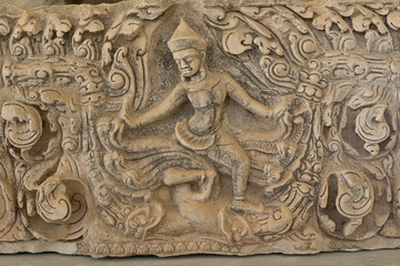 Fototapeta na wymiar Sandstone lintel depicting Indra on elephant Airavata. Khmer art in Thailand.