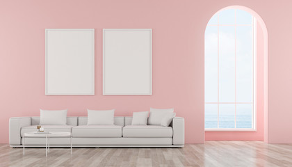 View of living room in minimal style with arch window design on sea view background.Room with picture frame and sofa on pastel color wall background. 3d rendering.	