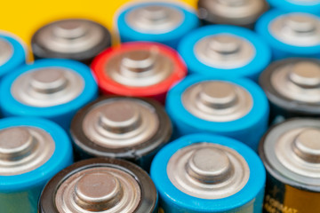 Used batteries. Waste collection and recycling. Environmental Protection. Batteries background.