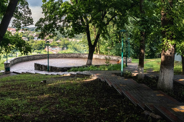 A viewing platform in the park on the edge of the canyon overlooking the old town of Kamianets-Podilskyi. Ukraine.