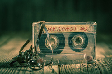 Closeup of old one cassette tape with an extracted tape