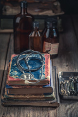 Antique stethoscope and books as medical education concept