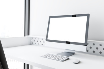 Fototapeta premium Mock up computer screen on white table