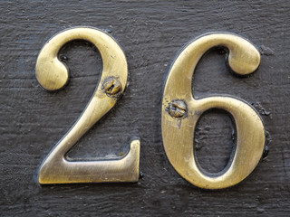House door number plate twenty six. House number twenty six