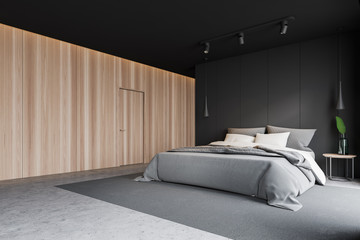 Gray master bedroom corner with door