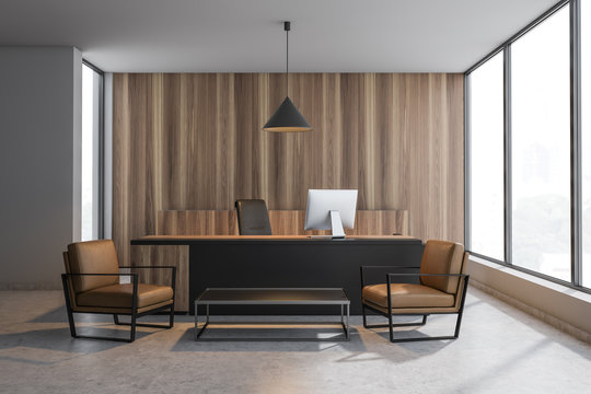 Wooden CEO office interior with armchairs