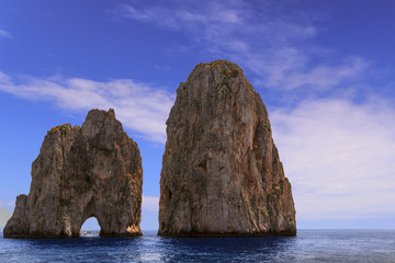 The Faraglioni Rocks on the coast of the island of Capri, Italy. Capri stacks, the symbol of the island, located in the gulf of Naples, Campania.