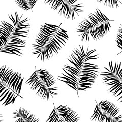Tropical leaves seamless pattern. Exotic palm leaf silhouette. Vector illustration.