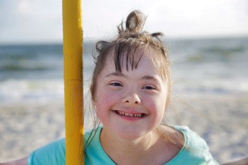 Portrait of down syndrome girl smiling © denys_kuvaiev