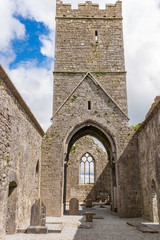 Fototapeta na wymiar A view inside the ruins of Clare Abbey a Augustinian monastery just outside Ennis, County Clare, Ireland that sits alongside the Fergus River