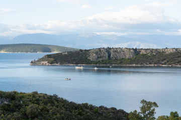 Landscape with small greek islands and bays on Peloponnese, Greece near Nafplio town, summer vacation destination