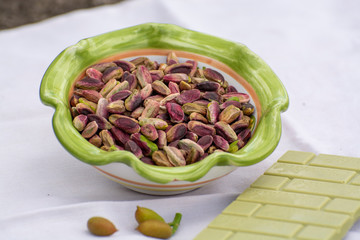 Sweet, delicate, fragrant nuts, Bronte pistachios with  brilliant green colour and handmade pistachio chocolate