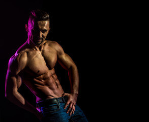 Sexy man. Passion guy. Fit body. Shirtless man in jeans.