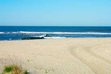Fototapeta na wymiar Sandy Hook Beach at Atlantic Highlands, New Jersey, on a beautiful sunny spring day -04