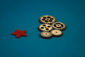 Gears, bearings and differential stars lie on the table close-up