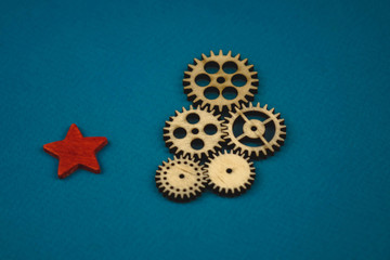 Gears, bearings and differential stars lie on the table close-up