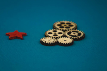 Gears, bearings and differential stars lie on the table close-up
