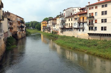 Fototapeta na wymiar Many house at riverside of Bacchiglione River in Vicenza City in
