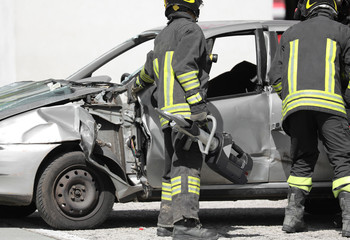 Fototapeta premium team of firefighters with shears