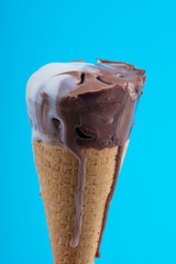 chocolate vanilla ice cream on blue  background