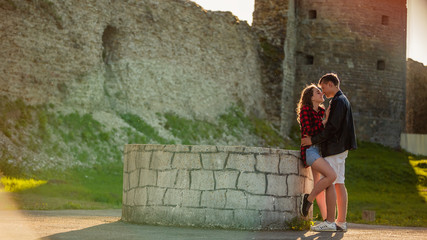 Fototapeta premium Beautiful couple walks in the woods