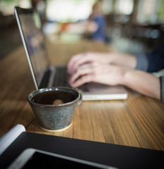 Woman Working in Coffeeshop