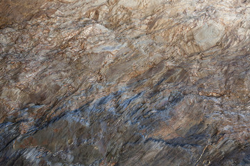 Superfície texturizada de rocha natural. Pode ser usada como fundo.