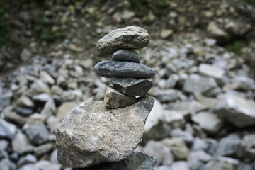 Fototapeta na wymiar Pile of rocks stacked on top of each other 