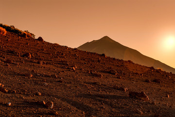 Volcano Teide, Tenerife Spain. Landscape view at sunset Surreal picture of a red desert terrain...