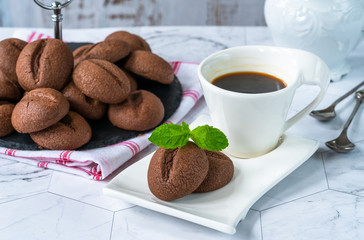 Coffee bean cookies with espresso coffee in a cup