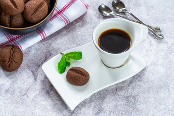 Coffee bean cookies with espresso coffee in a cup - high angle view