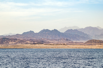 Mountain landscape with blue water in the national park Ras Mohammed, Egypt.