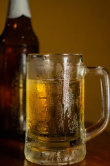 glass of beer with water drop