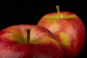 Tasty ripe apple on a dark table. Rich berries prepared to eat.