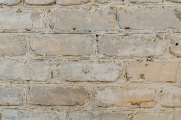Retro whitewashed old brick wall surface. White rustic texture. Vintage structure. Grungy shabby uneven painted plaster. Design element. Abstract white web banner