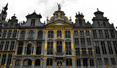 Fototapeta na wymiar View of the Grand Square in Brussels Belgium with Black Windows and Bright Gold Accents in the Window and Roof Trim