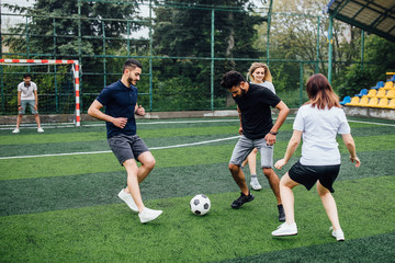 Football soccer training for students.  Football training session.  Running and kicking soccer...