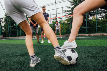 Boy puts his leg on ball on soccer field. Training, active lifestyle, sport, children activity concept © Тарас Нагирняк