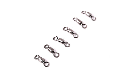 fishing accessories swivels white background close up