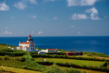 Fototapeta na wymiar lighthouse in azores, landscape of the lighthouse in sao miguel, azores portugal