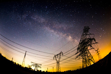 The outline of the power supply facilities and stars at night