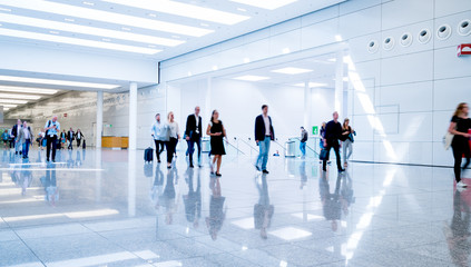 blurred people at a trade fair