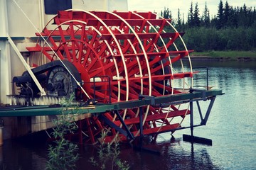 red paddle boat in the river