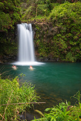 Fototapeta na wymiar Long expo shot of Puaa Kaa Falls at mile 22 along Road to Hana, Maui, Hawaii, USA